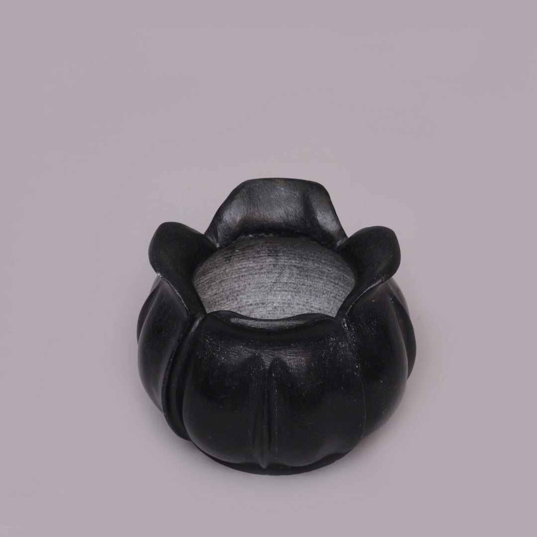 Handcrafted Black Marble Lotus Candle Holder with Sculpted Flared Petal Edges