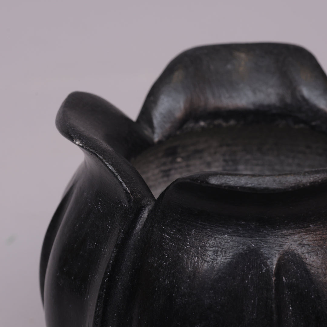 Handcrafted Black Marble Lotus Candle Holder with Sculpted Flared Petal Edges
