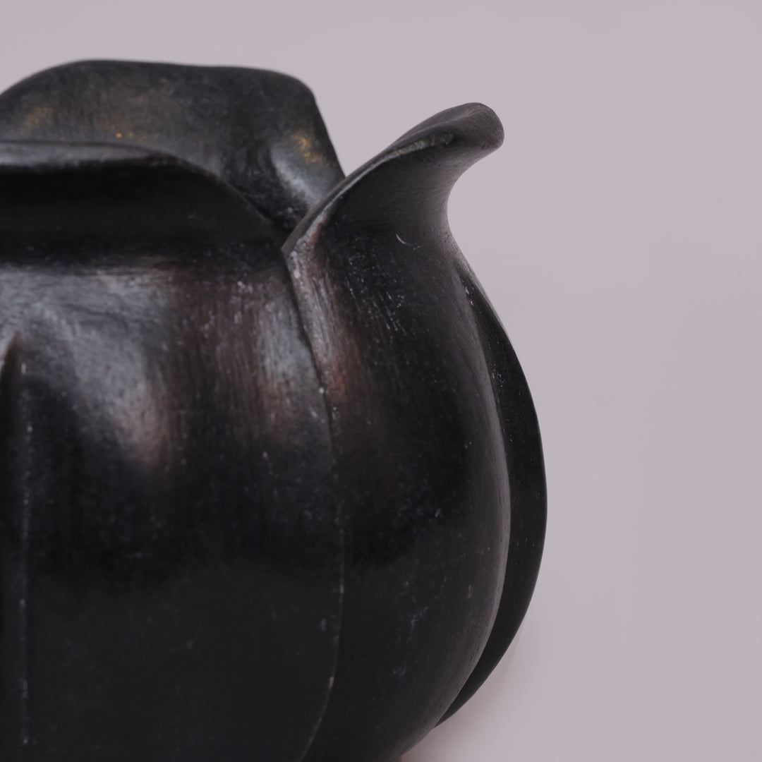 Handcrafted Black Marble Lotus Candle Holder with Sculpted Flared Petal Edges