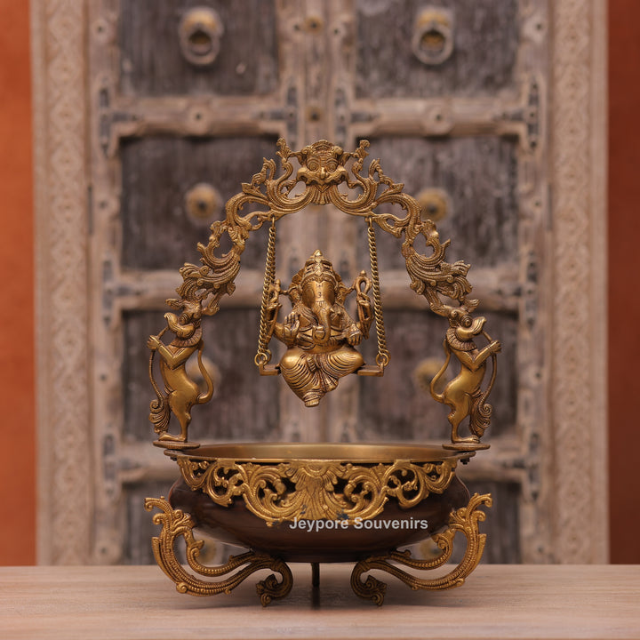 Traditional Handcrafted Brass Ganesha Swing Urli Bowl with Decorative Arch