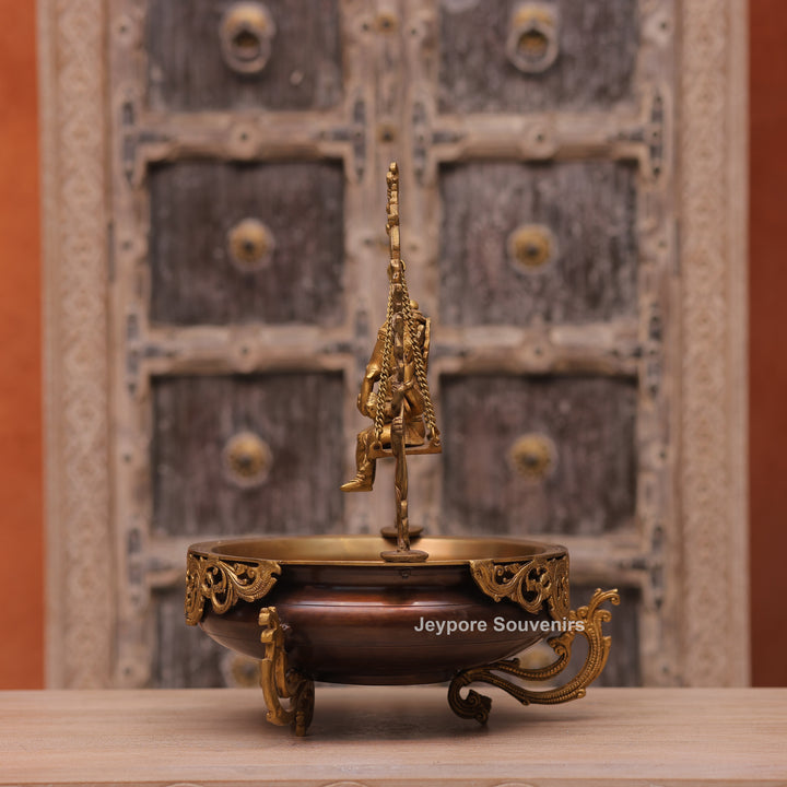 Traditional Handcrafted Brass Ganesha Swing Urli Bowl with Decorative Arch