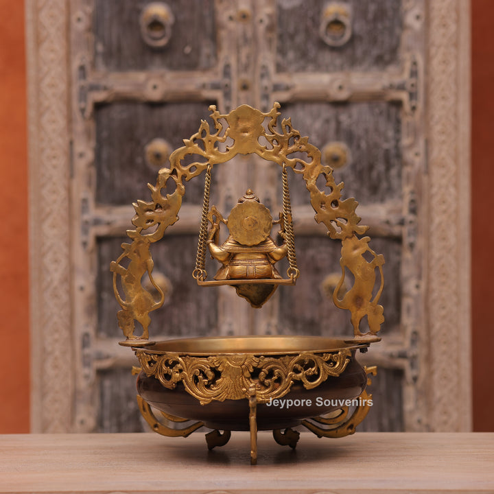 Traditional Handcrafted Brass Ganesha Swing Urli Bowl with Decorative Arch