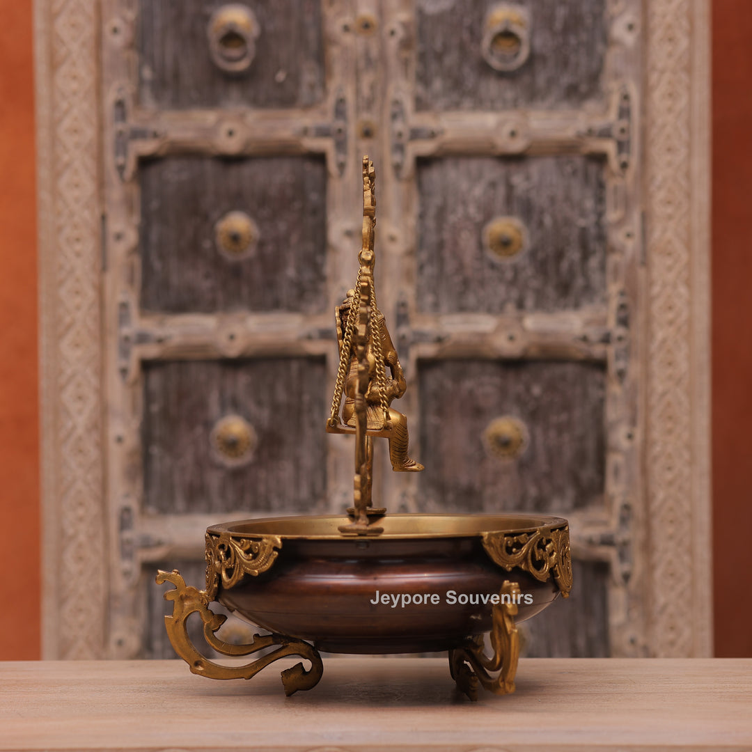 Traditional Handcrafted Brass Ganesha Swing Urli Bowl with Decorative Arch