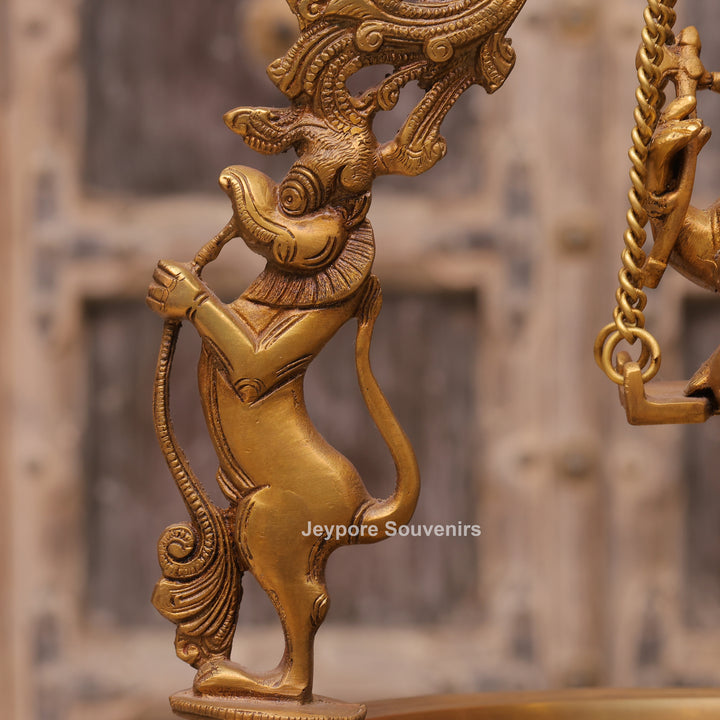 Traditional Handcrafted Brass Ganesha Swing Urli Bowl with Decorative Arch