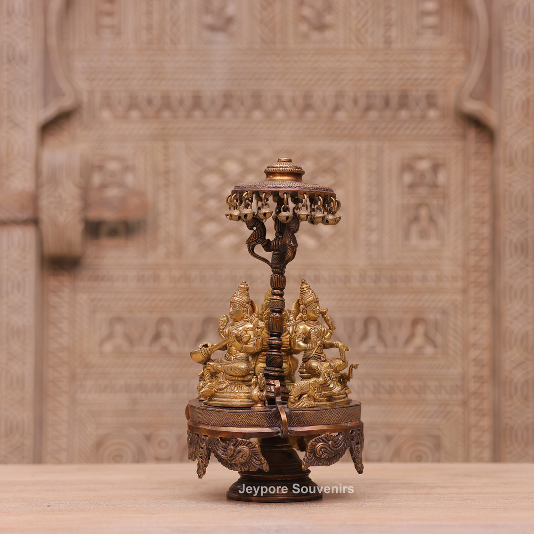 Handcrafted Brass Ganesha Lakshmi Saraswati Revolving Idol with Decorative Parasol