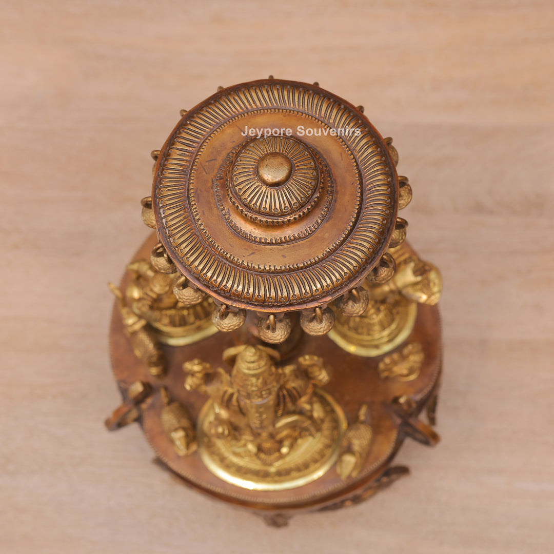 Handcrafted Brass Ganesha Lakshmi Saraswati Revolving Idol with Decorative Parasol