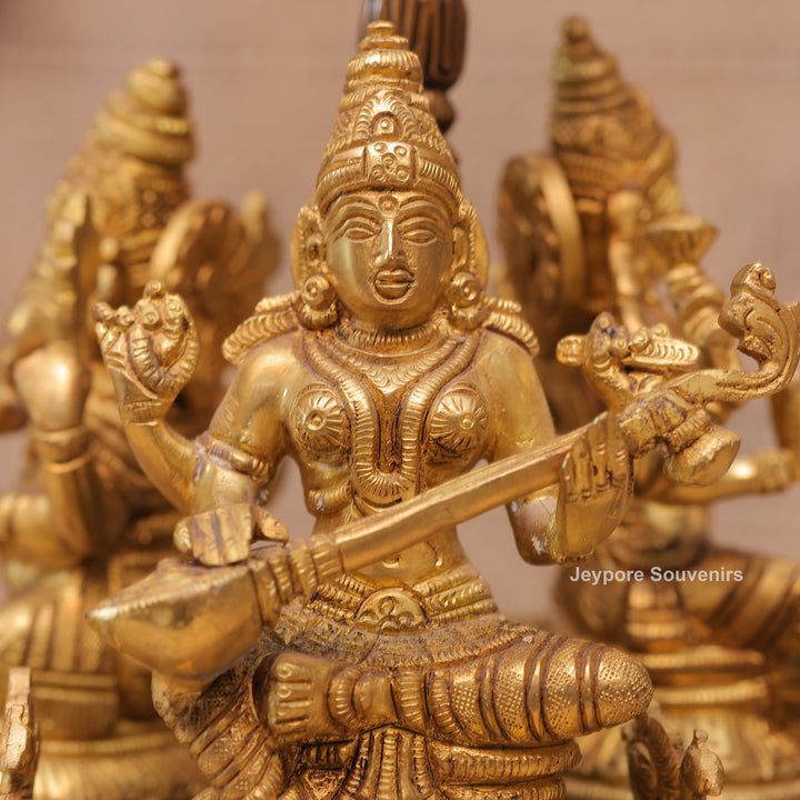 Handcrafted Brass Ganesha Lakshmi Saraswati Revolving Idol with Decorative Parasol