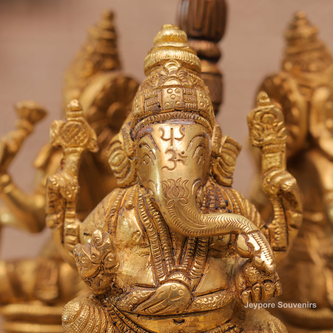 Handcrafted Brass Ganesha Lakshmi Saraswati Revolving Idol with Decorative Parasol