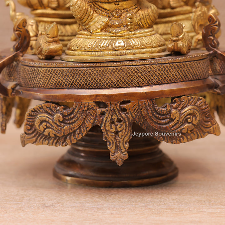 Handcrafted Brass Ganesha Lakshmi Saraswati Revolving Idol with Decorative Parasol