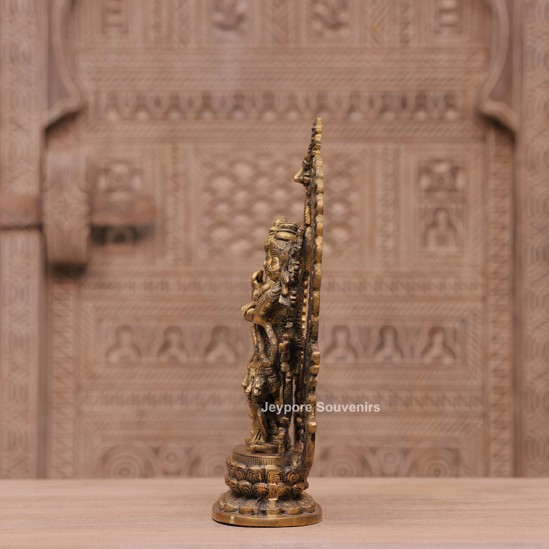 Handcrafted Brass Radha Krishna Statue with Ornamental Prabhavali Arch