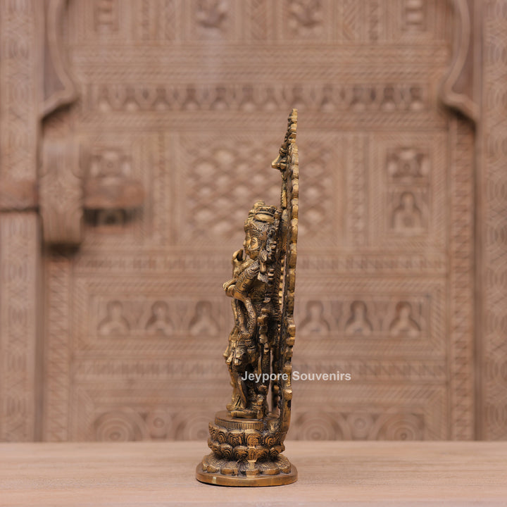 Handcrafted Brass Radha Krishna Statue with Ornamental Prabhavali Arch