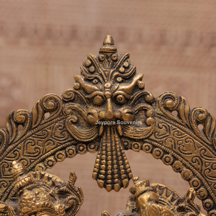 Handcrafted Brass Radha Krishna Statue with Ornamental Prabhavali Arch