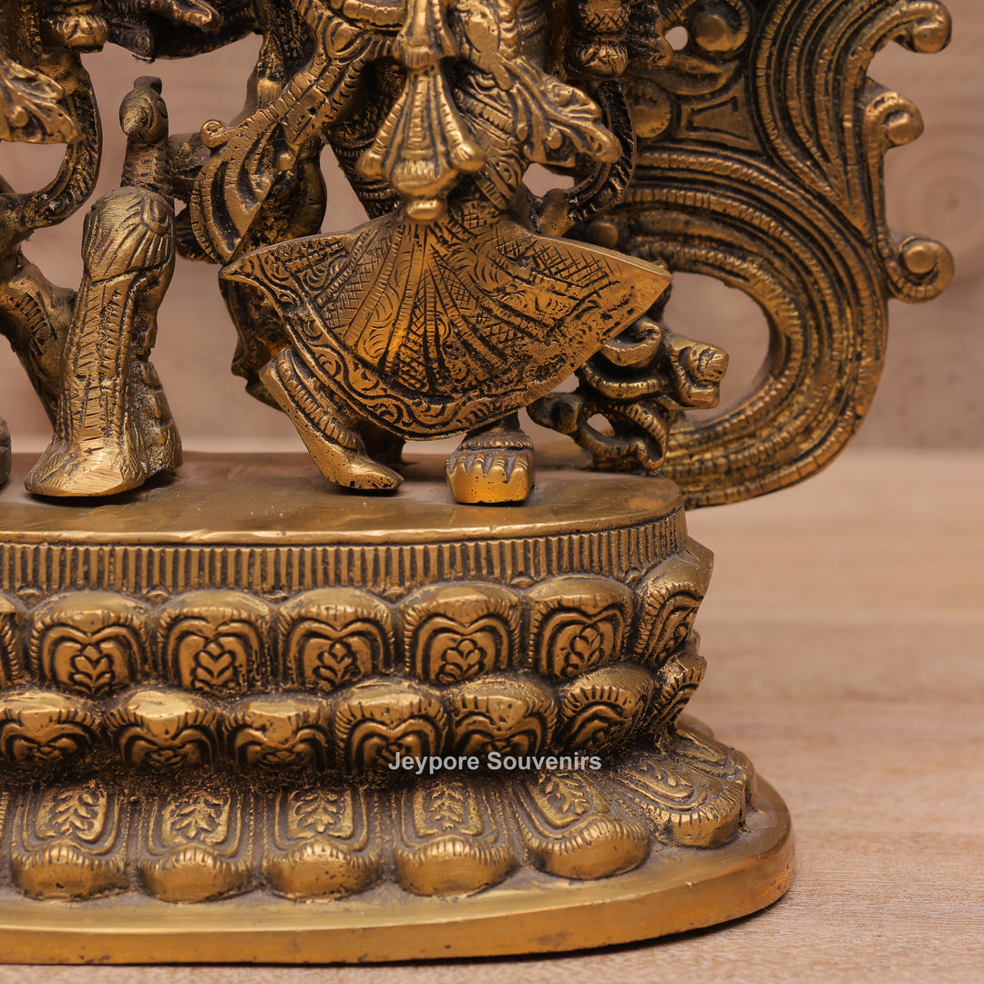 Handcrafted Brass Radha Krishna Statue with Ornamental Prabhavali Arch