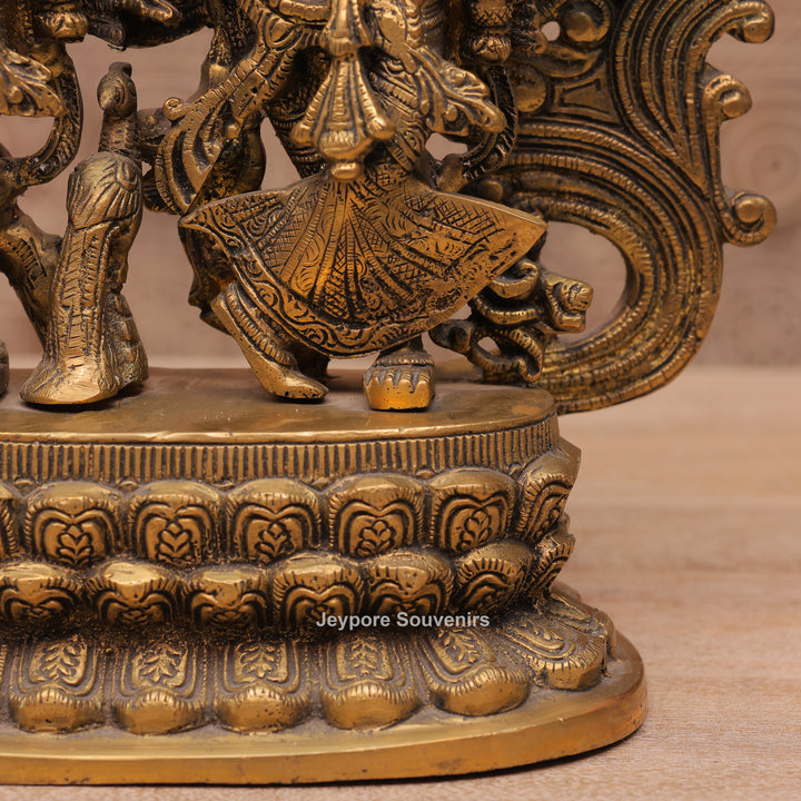 Handcrafted Brass Radha Krishna Statue with Ornamental Prabhavali Arch