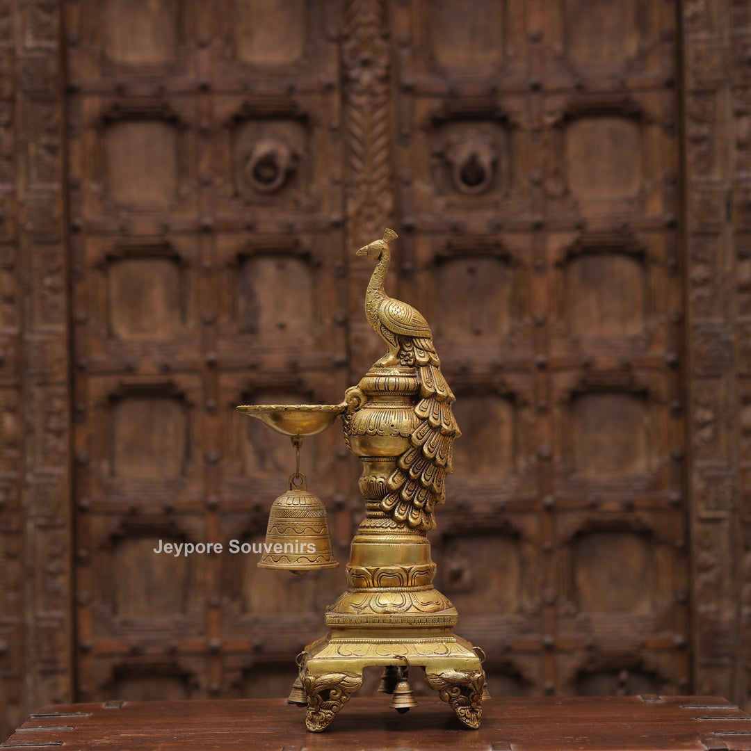 Handcrafted Brass Peacock Oil Lamp with Hanging Bells On Decorative Pedestal