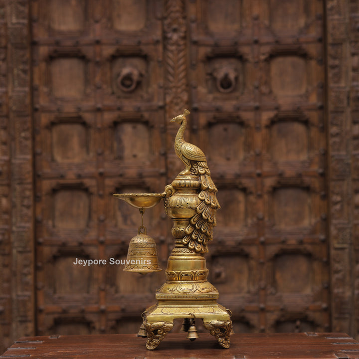 Handcrafted Brass Peacock Oil Lamp with Hanging Bells On Decorative Pedestal