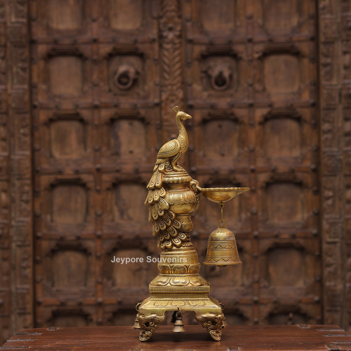 Handcrafted Brass Peacock Oil Lamp with Hanging Bells On Decorative Pedestal