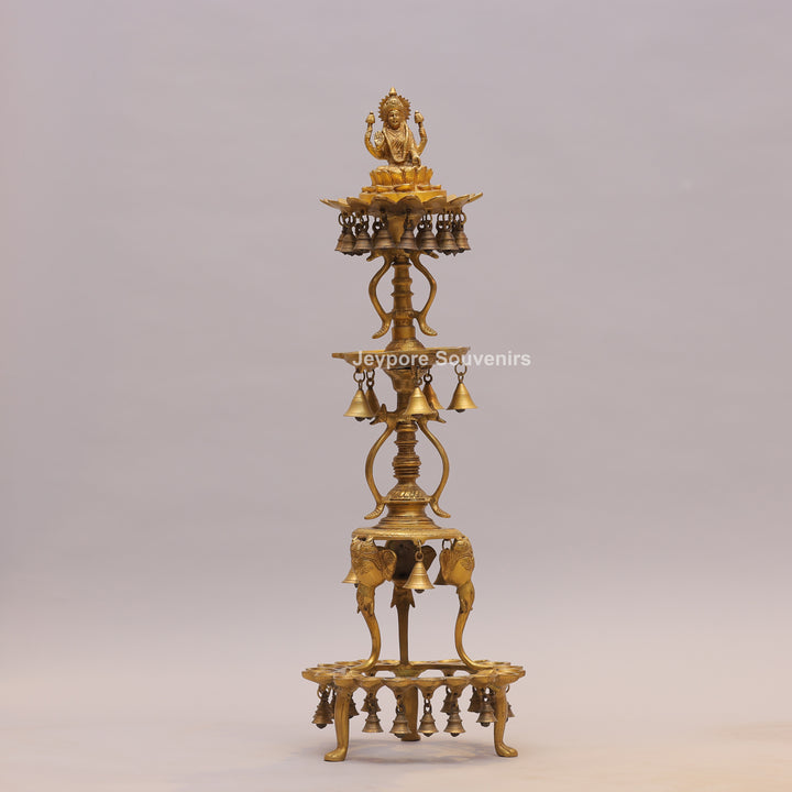 Handcrafted Brass Temple Lamp Stand with Lakshmi Idol &amp; Hanging Bells