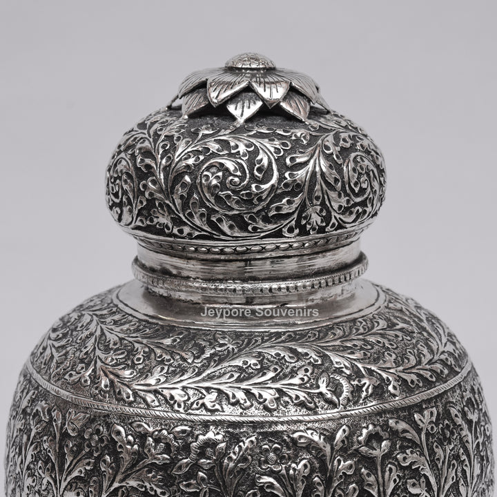 Handcrafted Silver Finish Floral Engraved Decorative Storage Urn with Elephant Motif