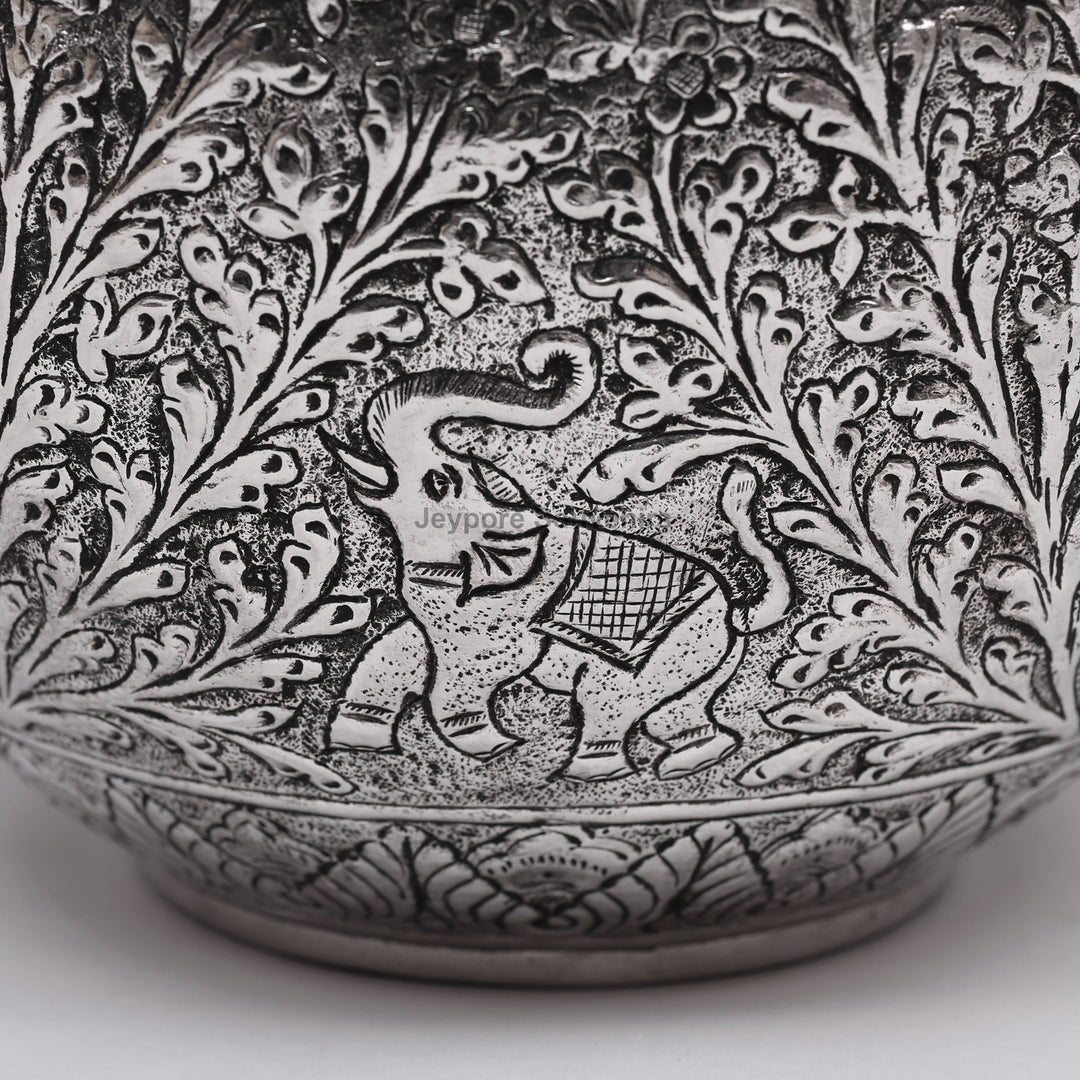 Handcrafted Silver Finish Floral Engraved Decorative Storage Urn with Elephant Motif