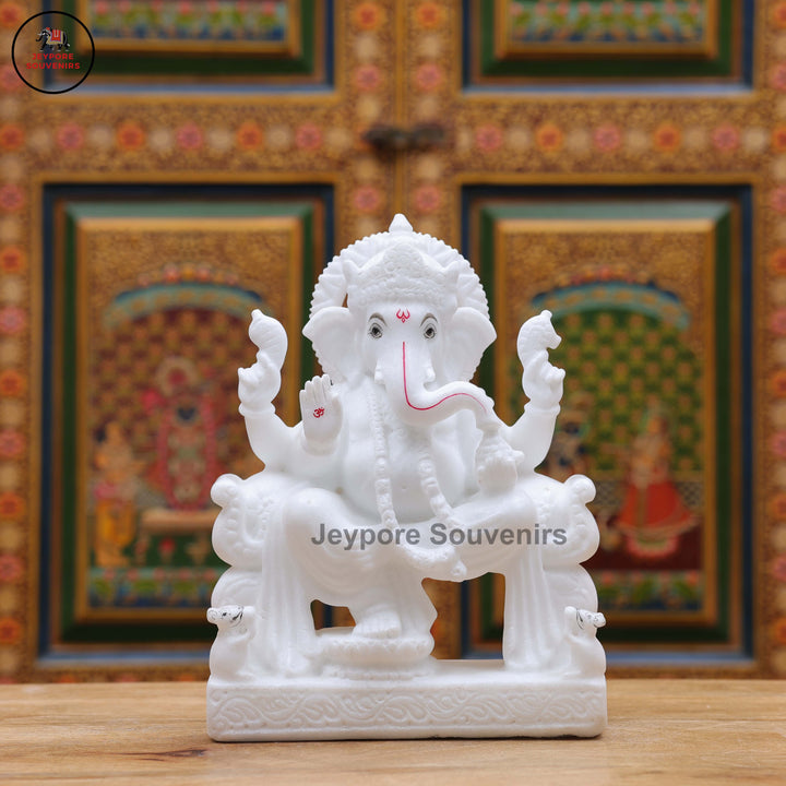Handcrafted Pure White Marble Lord Ganesha Idol Seated on Ornate Throne