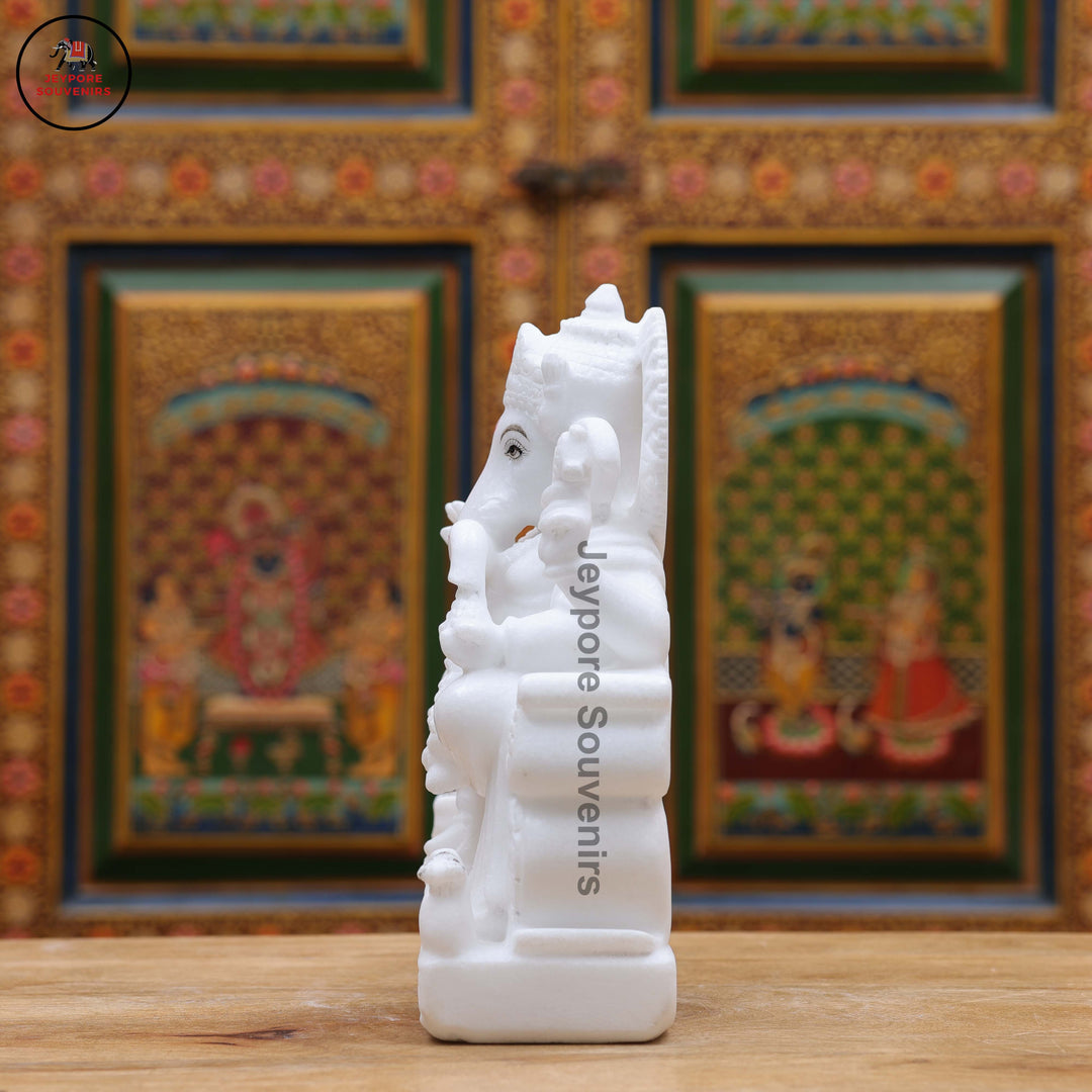 Handcrafted Pure White Marble Lord Ganesha Idol Seated on Ornate Throne