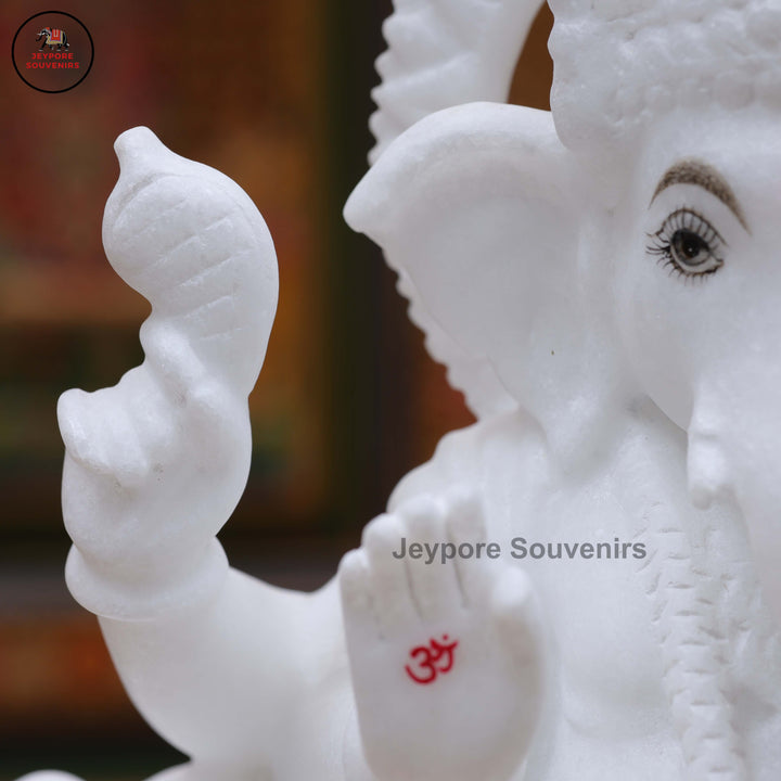 Handcrafted Pure White Marble Lord Ganesha Idol Seated on Ornate Throne