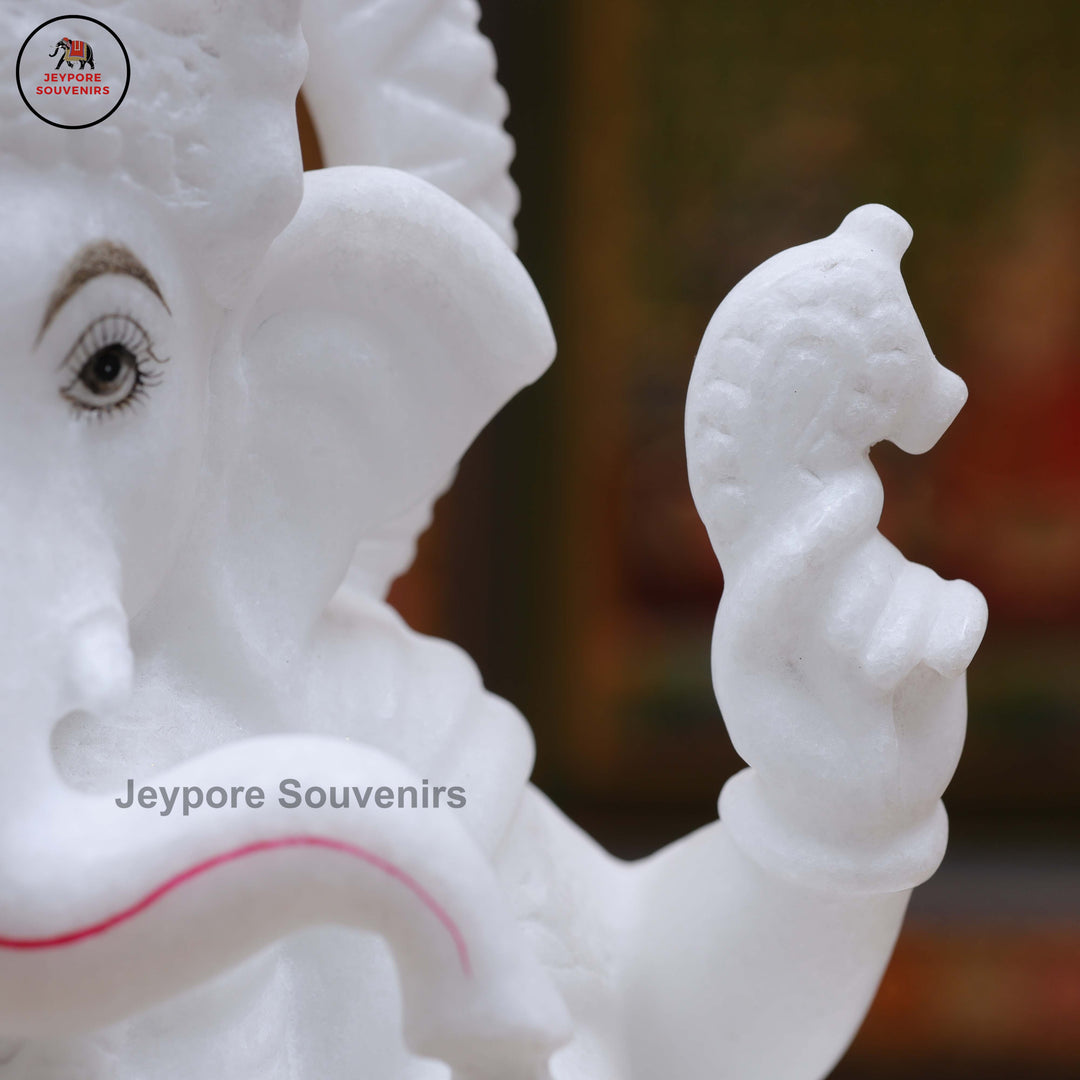 Handcrafted Pure White Marble Lord Ganesha Idol Seated on Ornate Throne