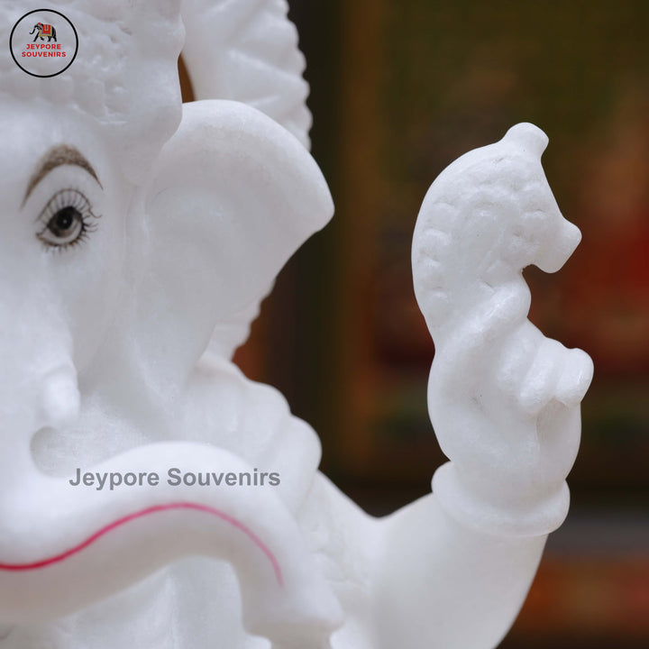 Handcrafted Pure White Marble Lord Ganesha Idol Seated on Ornate Throne