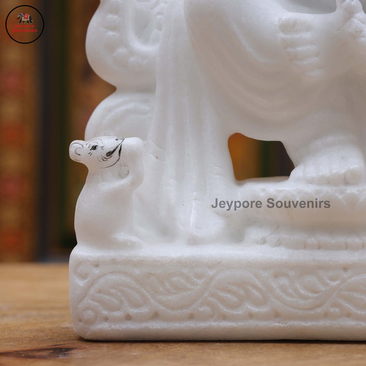 Handcrafted Pure White Marble Lord Ganesha Idol Seated on Ornate Throne