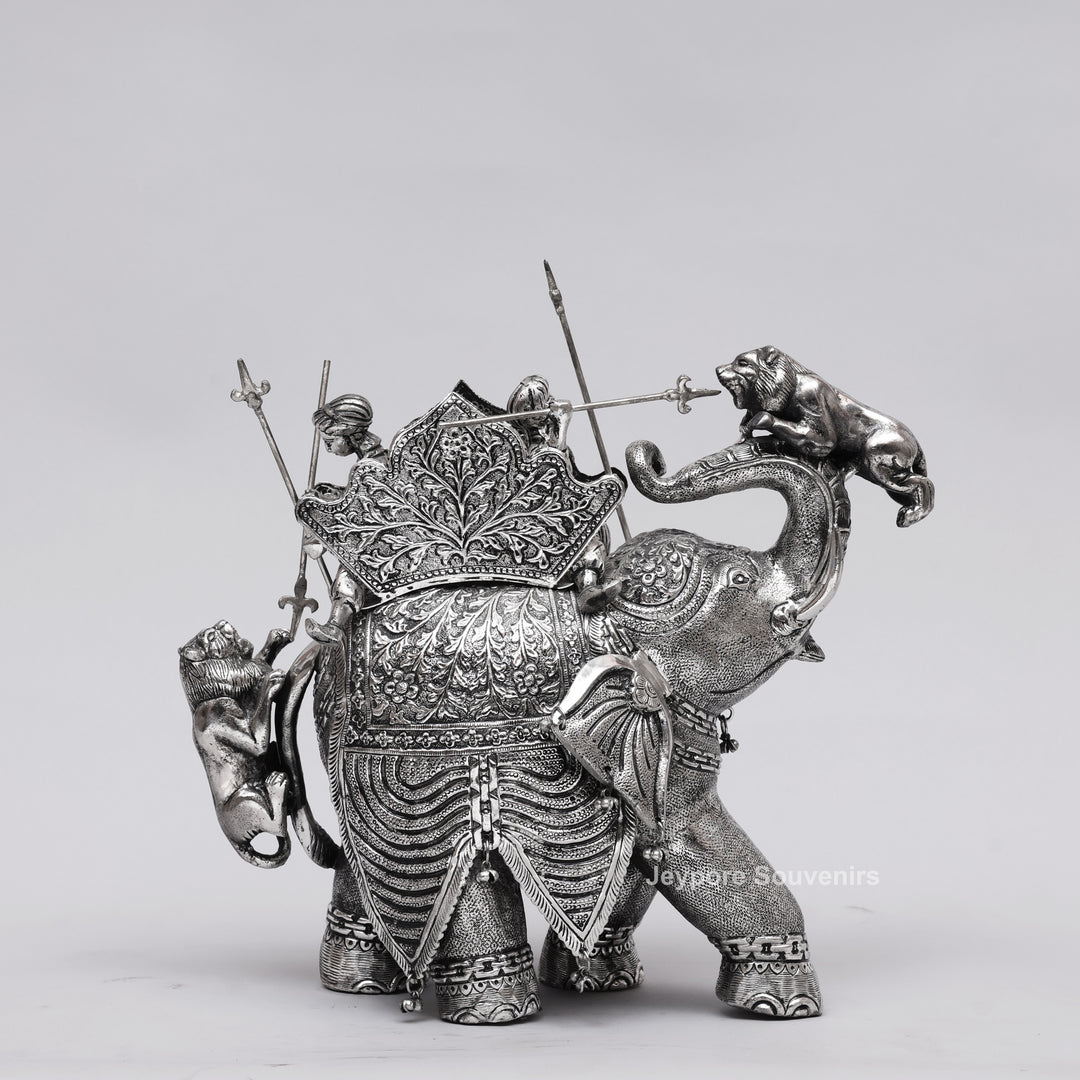 Handcrafted Silver-Plated Warrior Elephant Statue with Lion Battle Scene