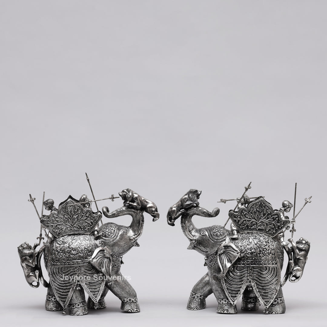 Handcrafted Silver-Plated Warrior Elephant Statue with Lion Battle Scene