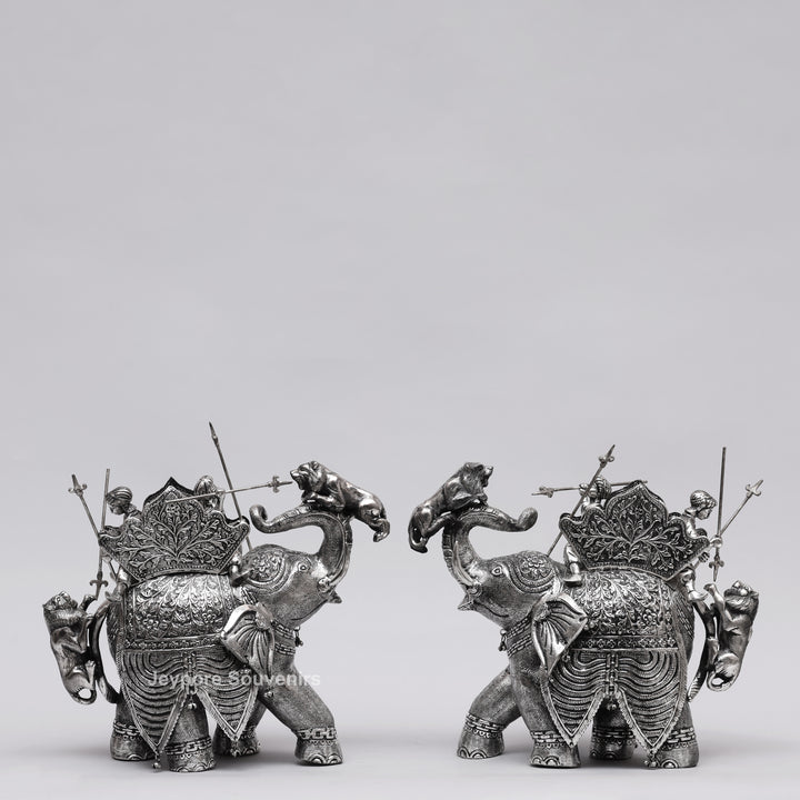 Handcrafted Silver-Plated Warrior Elephant Statue with Lion Battle Scene