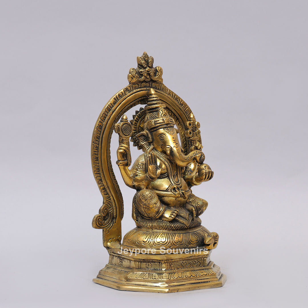 Handcrafted Brass Lord Ganesha Idol with Ornate Prabhavali Arch