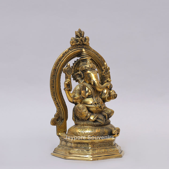 Handcrafted Brass Lord Ganesha Idol with Ornate Prabhavali Arch