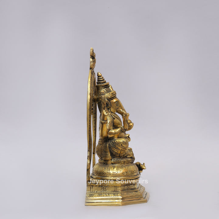 Handcrafted Brass Lord Ganesha Idol with Ornate Prabhavali Arch