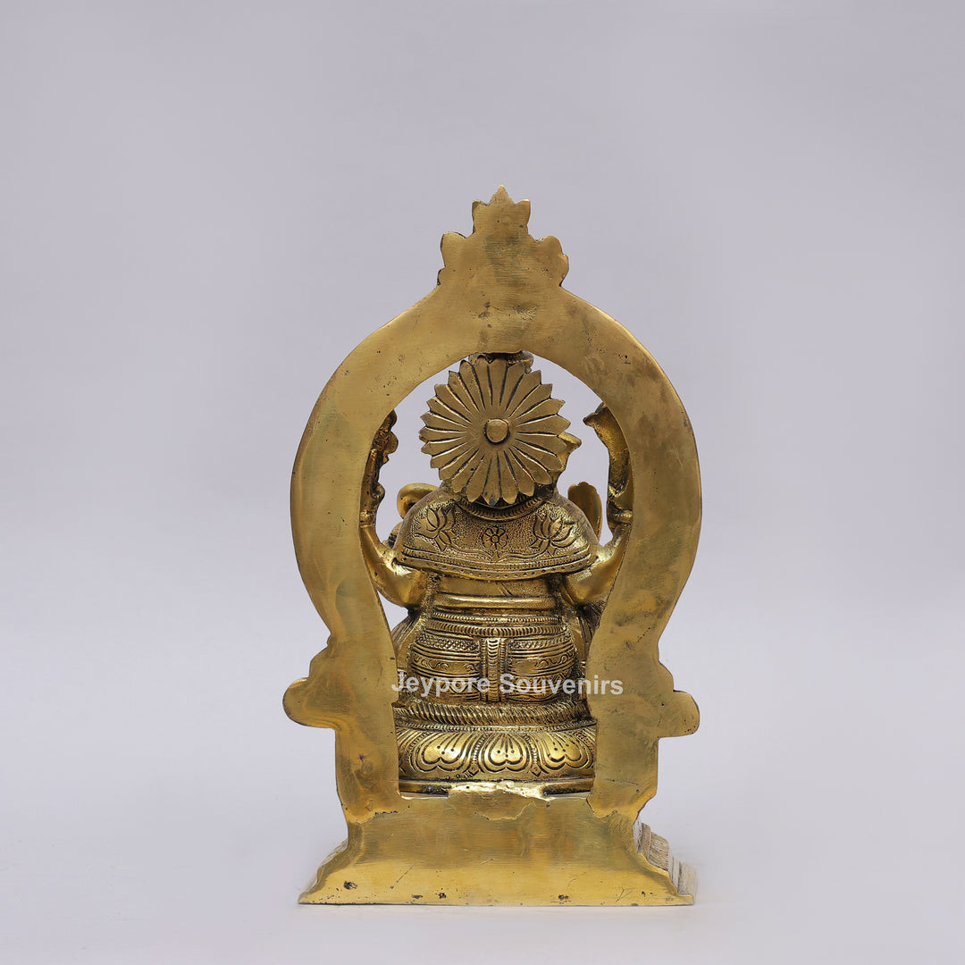 Handcrafted Brass Lord Ganesha Idol with Ornate Prabhavali Arch