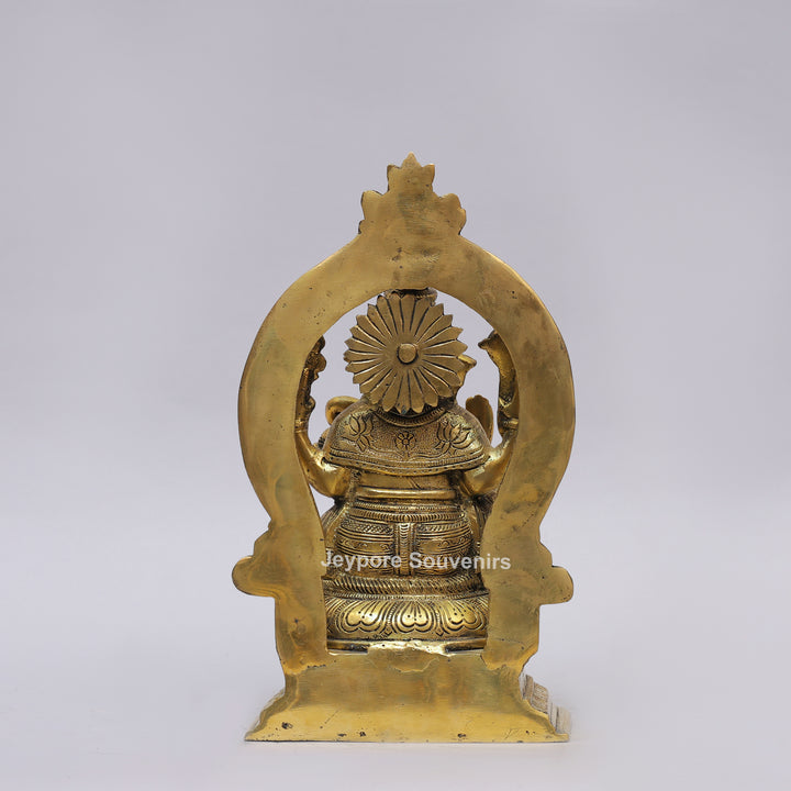Handcrafted Brass Lord Ganesha Idol with Ornate Prabhavali Arch