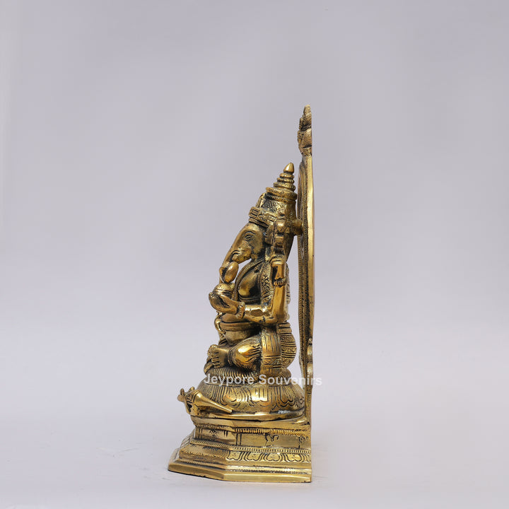 Handcrafted Brass Lord Ganesha Idol with Ornate Prabhavali Arch