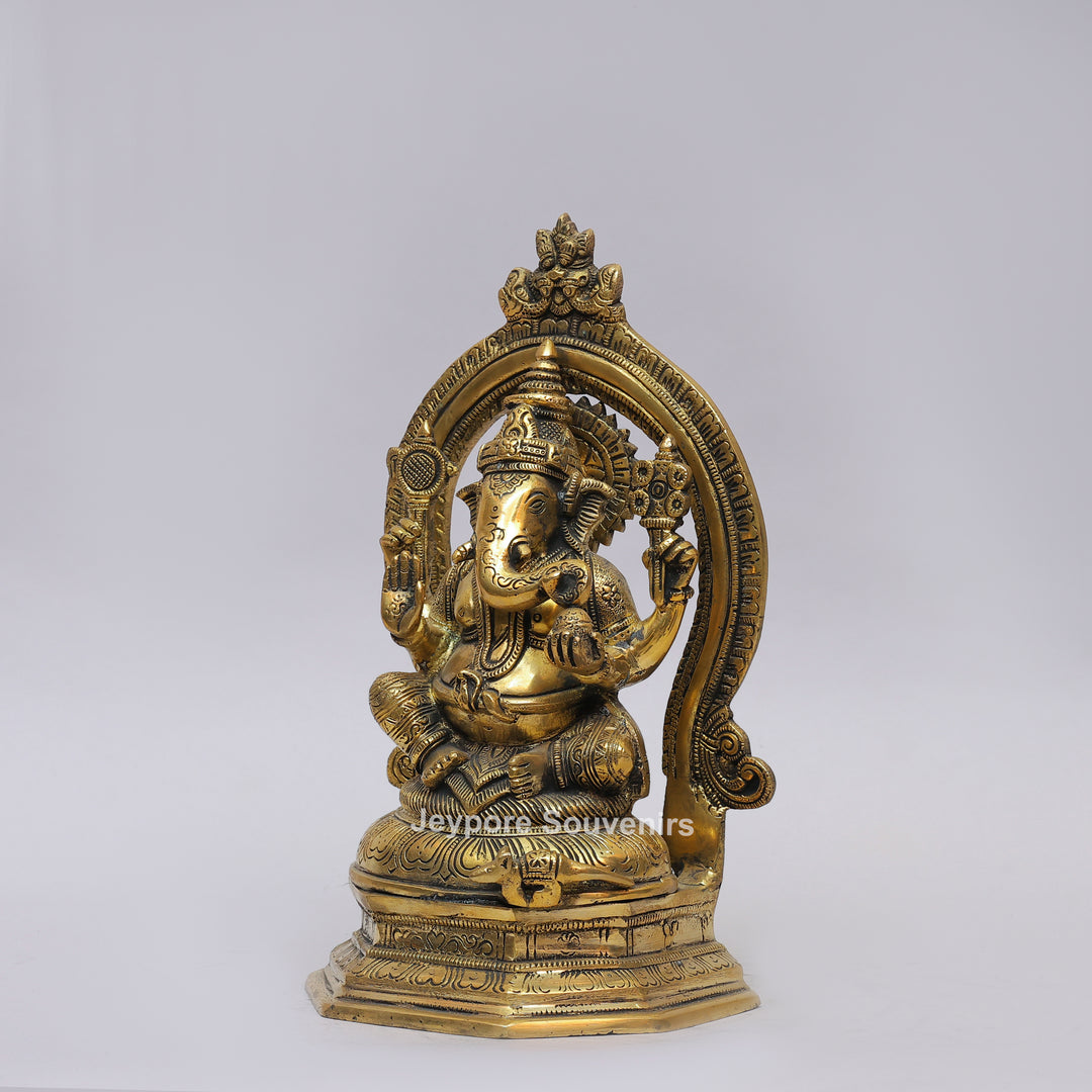 Handcrafted Brass Lord Ganesha Idol with Ornate Prabhavali Arch