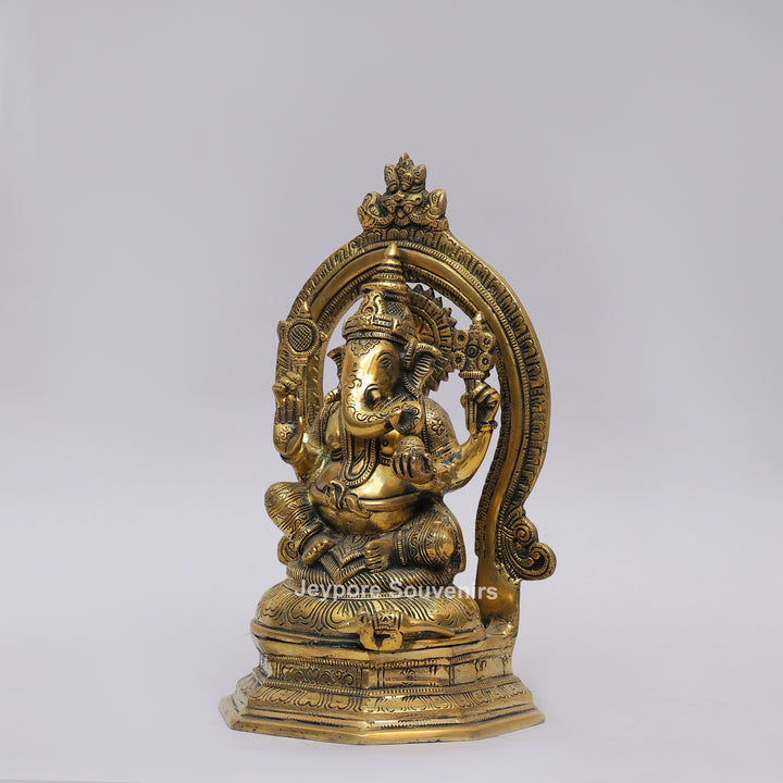 Handcrafted Brass Lord Ganesha Idol with Ornate Prabhavali Arch
