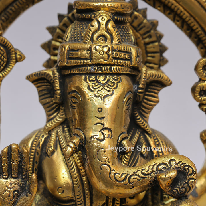 Handcrafted Brass Lord Ganesha Idol with Ornate Prabhavali Arch