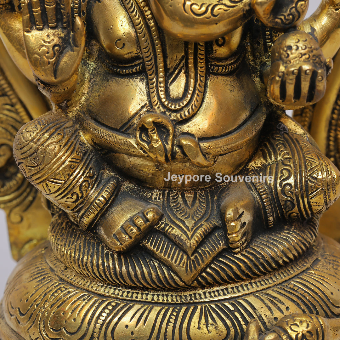 Handcrafted Brass Lord Ganesha Idol with Ornate Prabhavali Arch