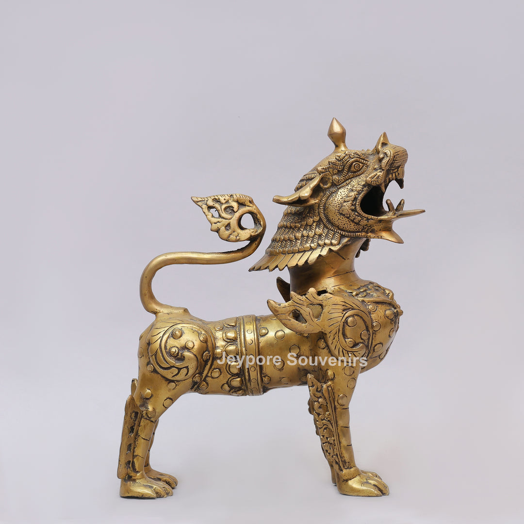 Handcrafted Solid Brass Tibetan Snow Standing Lion Statue with Ornate Scrollwork