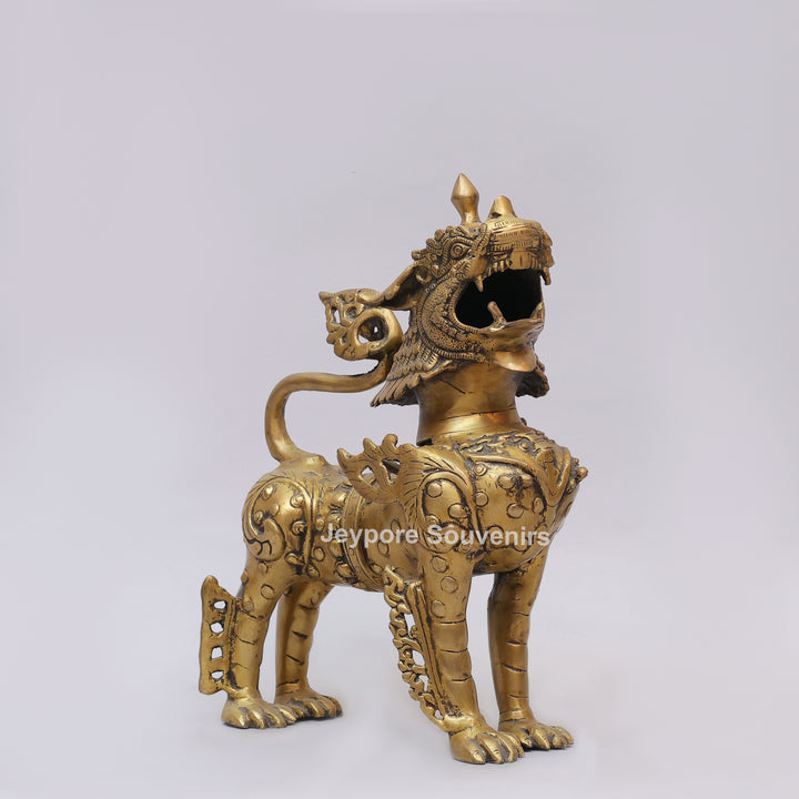 Handcrafted Solid Brass Tibetan Snow Standing Lion Statue with Ornate Scrollwork