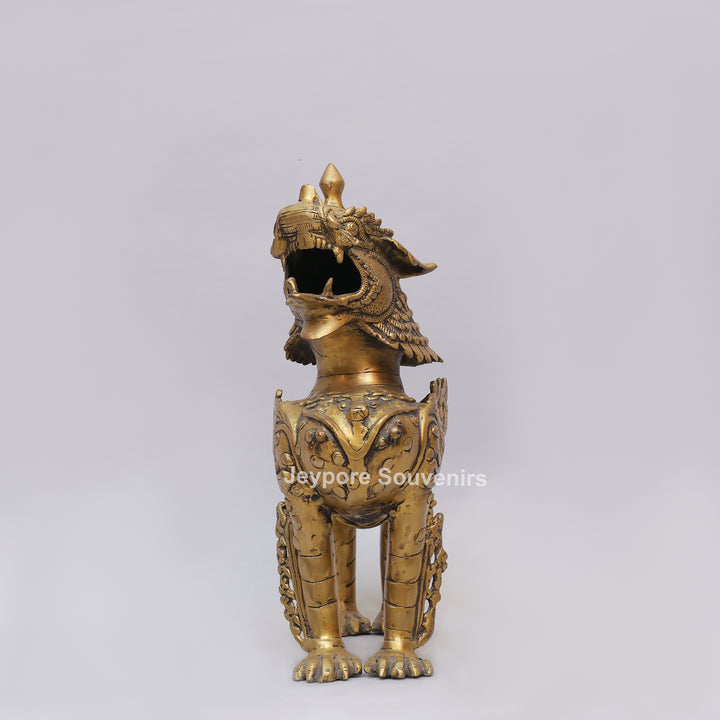 Handcrafted Solid Brass Tibetan Snow Standing Lion Statue with Ornate Scrollwork