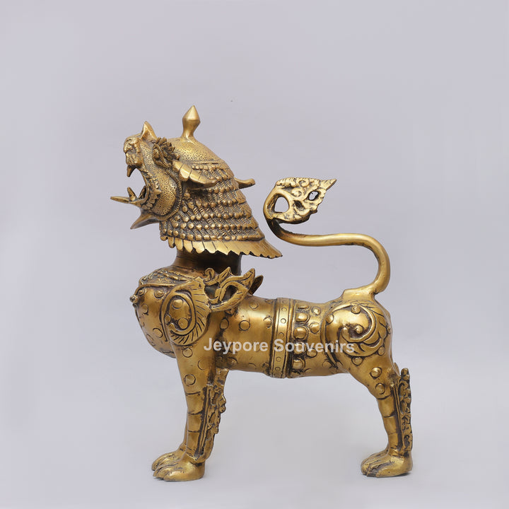 Handcrafted Solid Brass Tibetan Snow Standing Lion Statue with Ornate Scrollwork