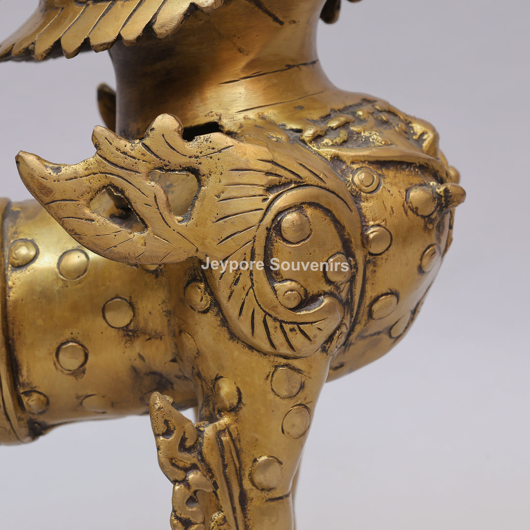 Handcrafted Solid Brass Tibetan Snow Standing Lion Statue with Ornate Scrollwork