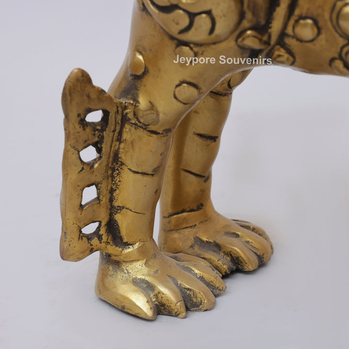 Handcrafted Solid Brass Tibetan Snow Standing Lion Statue with Ornate Scrollwork