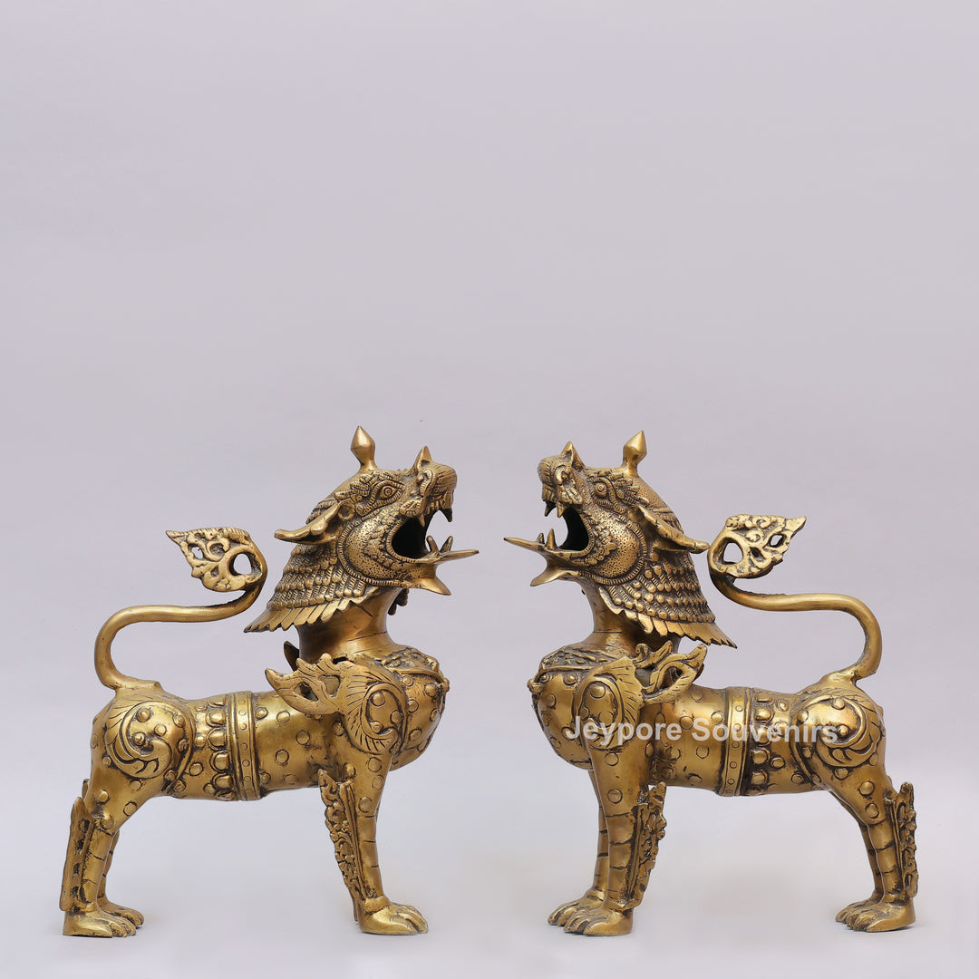 Handcrafted Solid Brass Tibetan Snow Standing Lion Statue with Ornate Scrollwork